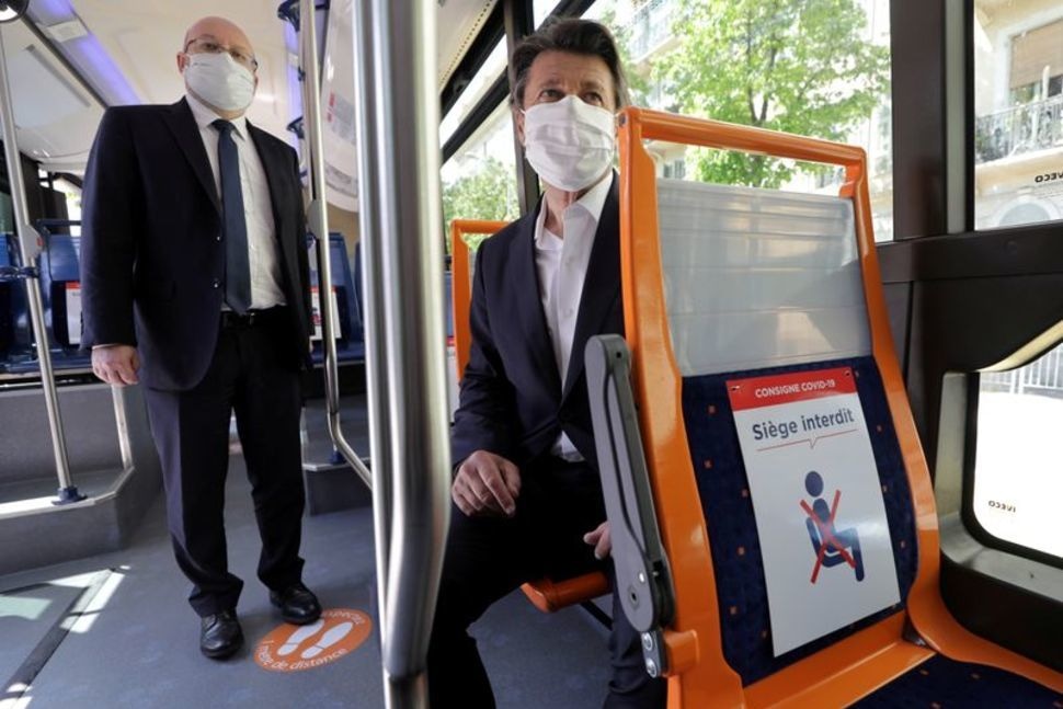 Christian Estrosi, Mayor of Nice, wearing a protective face mask, poses in a bus for the presentation of social distancing measures during the outbreak of Covid-19 in Nice, France, May 6. — Reuters
