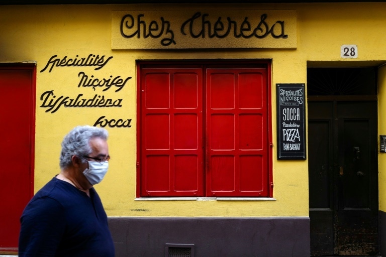 Masks will be compulsory on public transport in France and regions will reopen according to the seriousness of their outbreaks. &mdash; AFP
