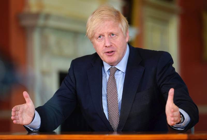 A handout image released by 10 Downing Street, shows Britain's Prime Minister Boris Johnson being filmed giving his address to the nation inside 10 Downing Street in London on May 9, 2020, as the government sets out it's roadmap to ease the national lockdown due to the novel coronavirus COVID-19 pandemic. - Prime Minister Boris Johnson issued new stay-at-home advice on Sunday, May 10, and warned he would proceed cautiously on lifting a nationwide coronavirus lockdown as the death toll in Britain, already the highest in Europe, continues to mount. (Photo by Andrew PARSONS / 10 Downing Street /