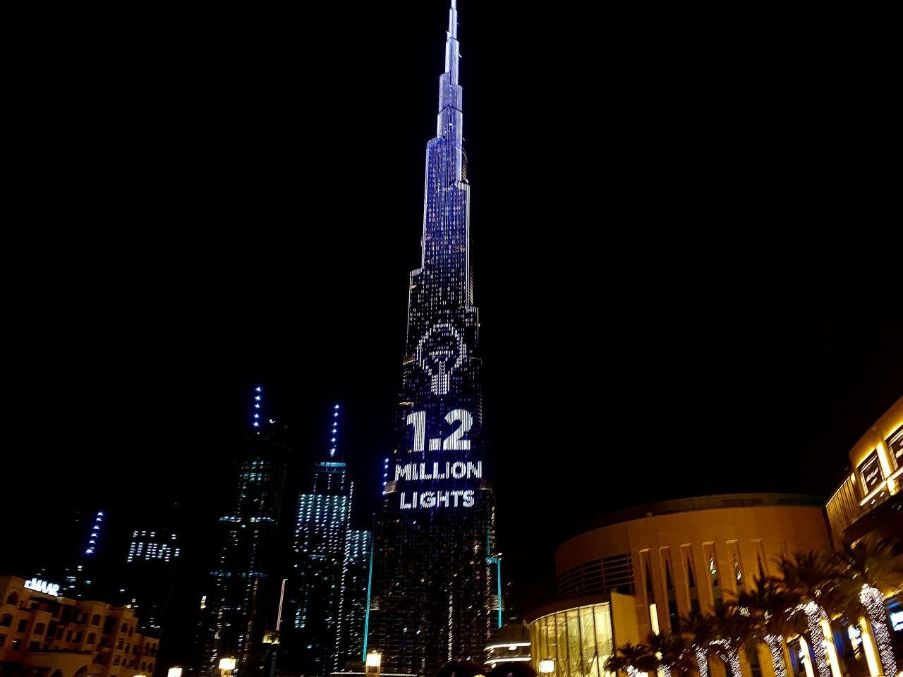 Dubai's Burj Khalifa, the world's tallest building, lit its 1.2 million lights to become the world's tallest donation box to buy meals for people hit by the impact of Covid-19. — Reuters