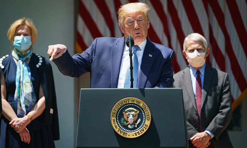 US President Donald Trump speaks on vaccine development in the Rose Garden of the White House in Washington, DC on May 15. — AFP