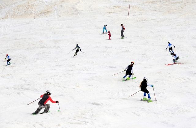 People ski on the slopes of Kanin after the Slovenian government called an official end to the country's Covid-19 outbreak, in Kanin, Slovenia, May 17. &mdash; Reuters
