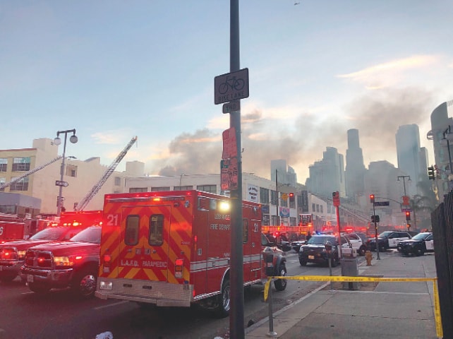 Eleven firefighters hurt while running away from blast in Los Angeles ...