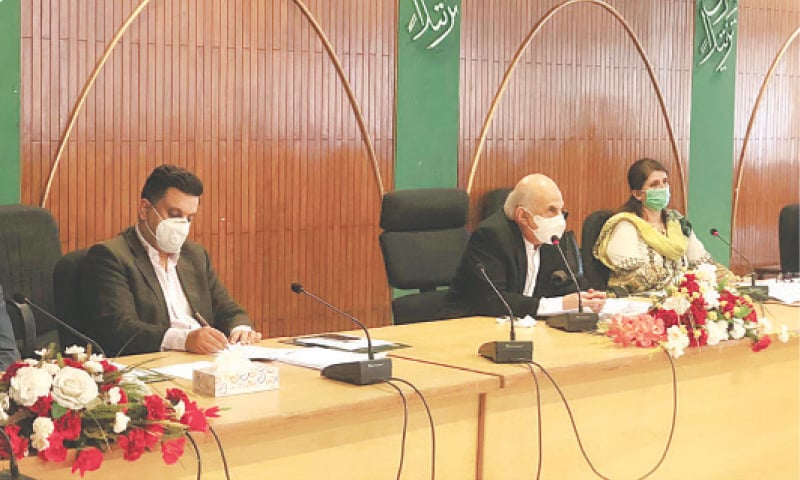 ISLAMABAD: Planning Commission Deputy Chairman Jehanzeb Khan chairs a session of the CDWP on Tuesday.