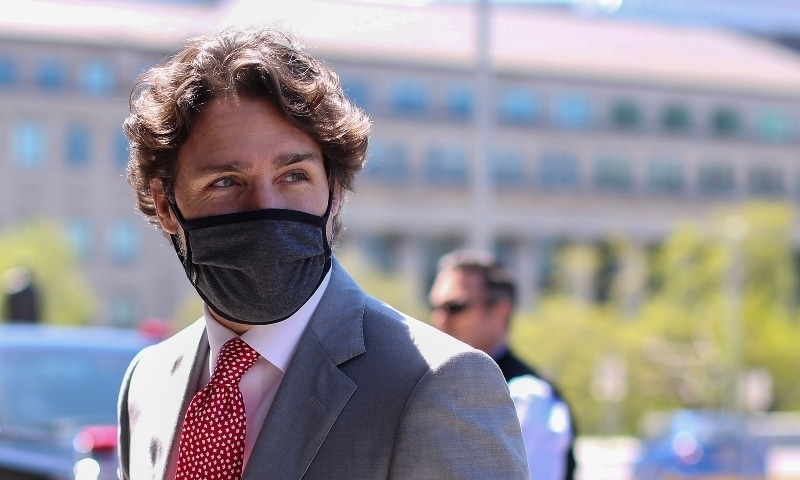 Canadian Prime Minister Justin Trudeau arrives on Parliament Hill to attend a sitting of the Special Committee on Covid-19 on May 20. — AFP