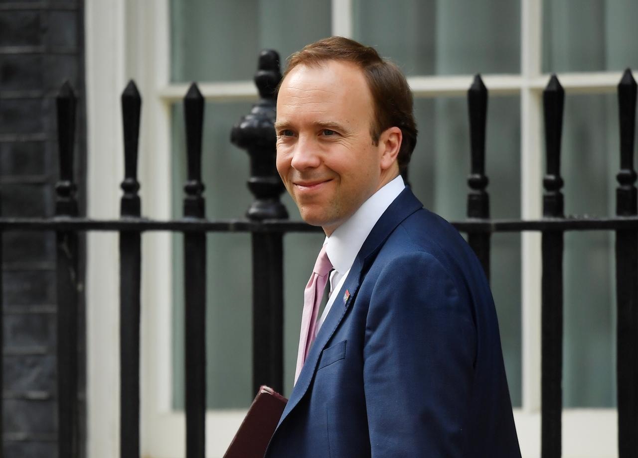 Britain's Secretary of State of Health Matt Hancock is seen at Downing Street. — Reuters