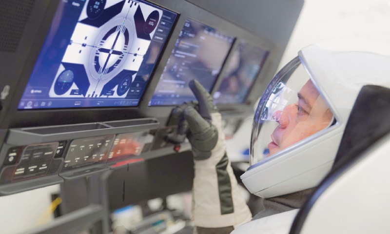 HAWTHORNE (US): Bob Behnkin, a Nasa astronaut, does training exercises in this California town.—AP