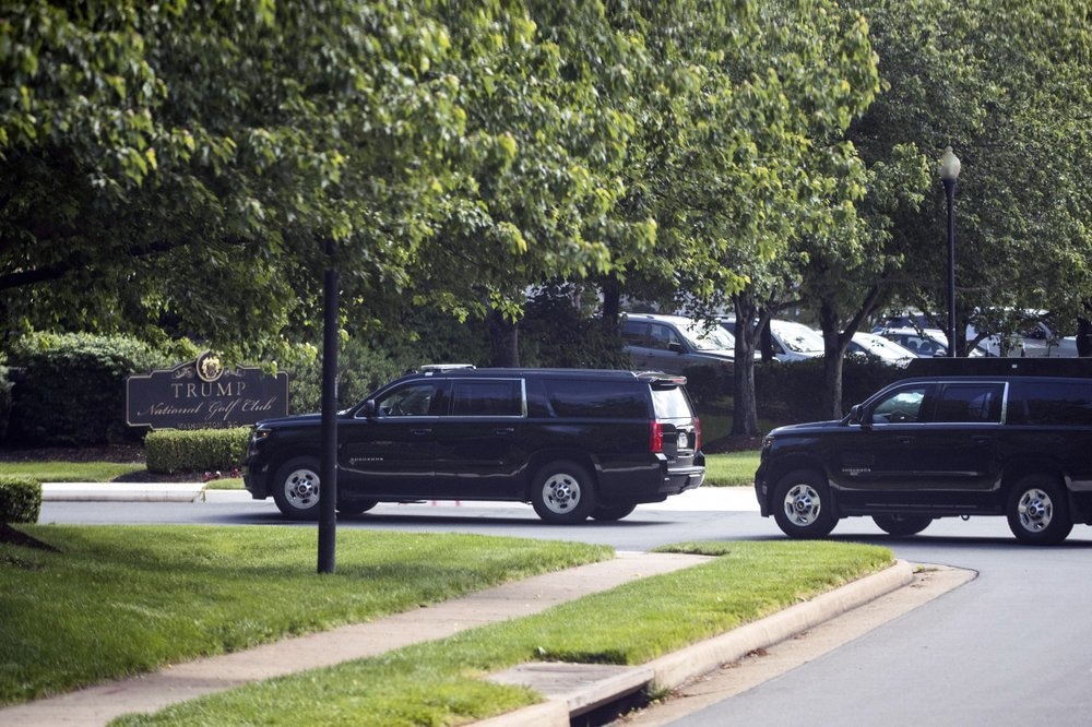 The motorcade for US President Donald Trump arrives at Trump National Golf Club, May 23, in Sterling, Virginia, US. — AP