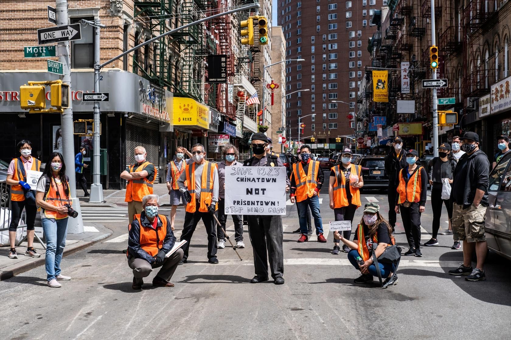 Volunteers from the Chinatown Block Watch neighbourhood patrol group pose for pictures before patrolling in Chinatown in New York City, US, May 17. — Reuters