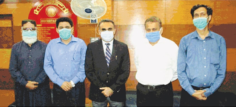 KARACHI: Secretary Sports Sindh Imtiaz Ali Shah is seen with organisers of the first online basketball coaching course including Shehzad Kazi of Sports for Life, KBBA’s Ghulam Mohammad, Asad Ibad Khan and Additional Secretary sports Shakir Qayyum Khanzada during a meeting here on Tuesday.