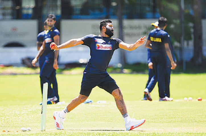 COLOMBO: Sri Lankan cricketer Lahiru Kumara bowls during a practice session at the Colombo Colts Cricket Stadium on Tuesday.—AFP