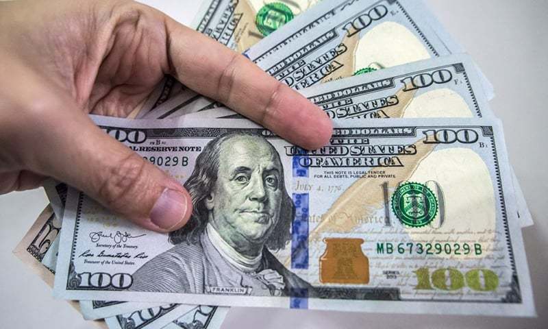 Currency dealers cite multiple reasons for pressure on exchange rate including government’s growing forex needs. ⁠— AFP/File