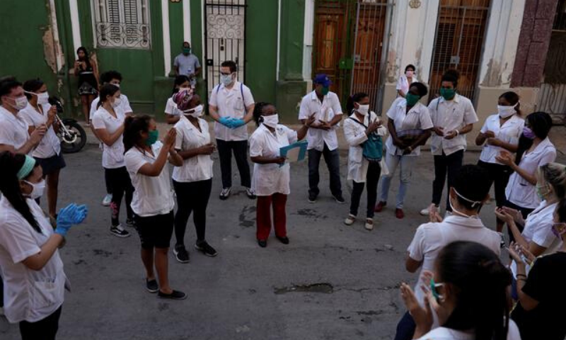 Doctor Xiomara Acosta gives orientations to medical students before checking door-to-door for people with symptoms amid concerns about the spread of the coronavirus. &mdash; Reuters