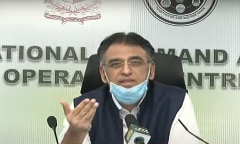 Minister for Planning, Development and Special Initiatives Asad Umar addressing a press conference in Islamabad. — DawnNewsTV