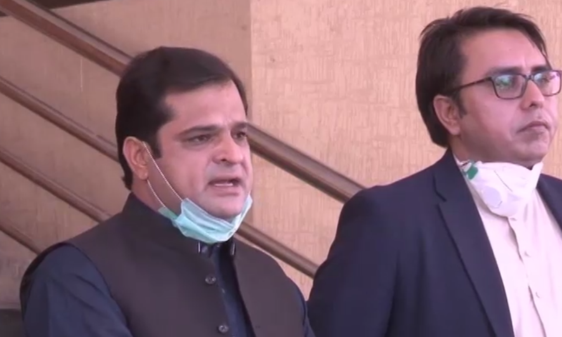 Liaquat Shahwani and Shahbaz Gill address the media. &mdash; DawnNewsTV