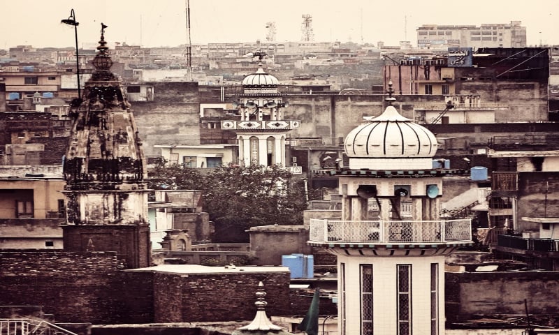 Mandir spire juxtaposed with Mosque Minar in the Bhabra bazaar neighbourhood of Old Rawalpindi. Currently, there is no temple for the Hindu community in Islamabad. —Muhammad Bin Naveed/File