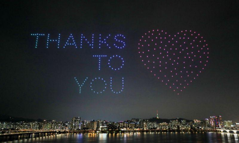 Drones fly over the Han river showing messages to support the country as measures to avoid the spread of the coronavirus continue in Seoul, South Korea. — Reuters