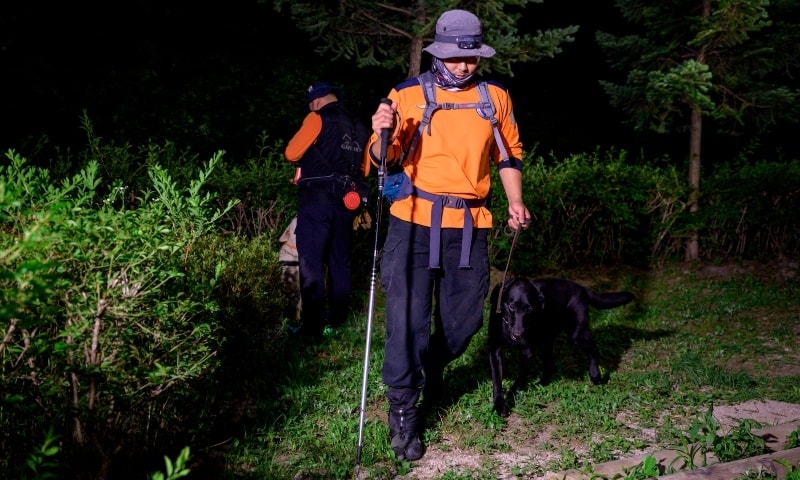 Search and rescue teams prepare to search Waryong park for Seoul mayor Park Won-soon, who was last seen there and was reported missing earlier in the day, in Seoul. — AFP