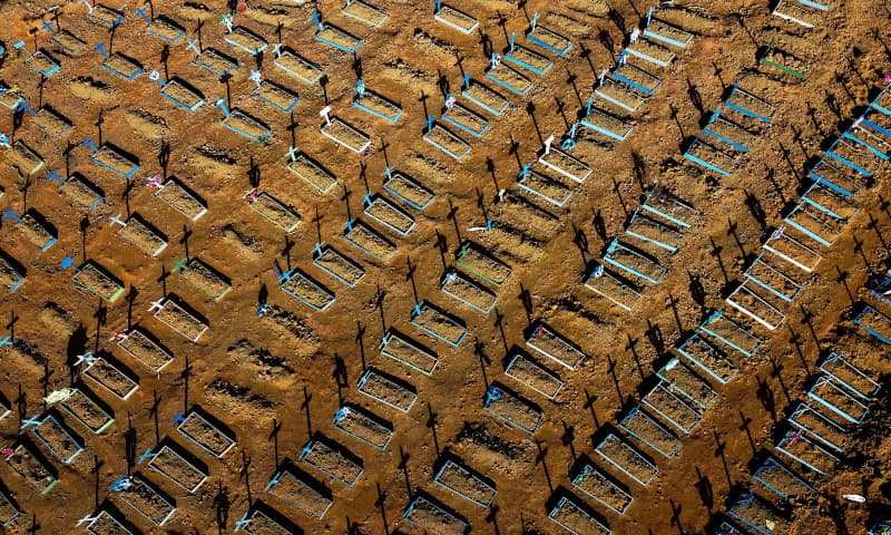 This file photo taken on June 21, 2020 shows an aerial view showing graves in the Nossa Senhora Aparecida cemetery in Manaus, Brazil. &mdash; AFP