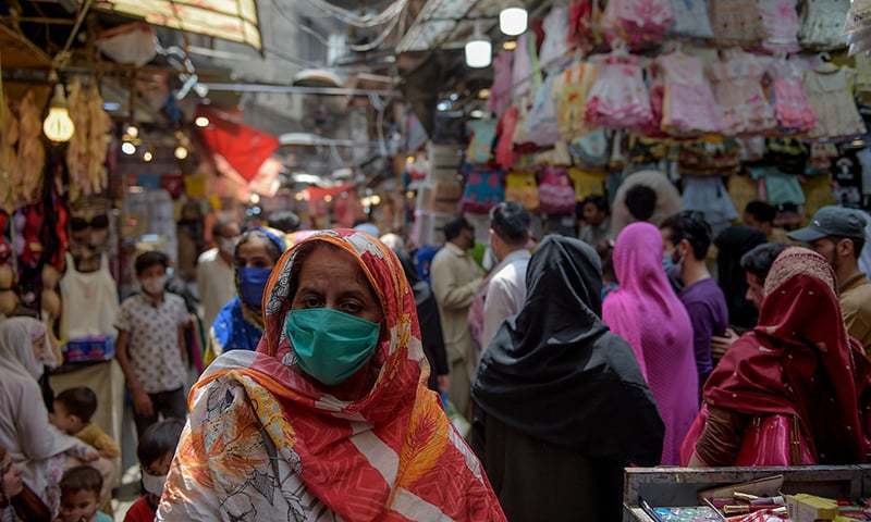 Punjab health secy claims virus positivity rate down but can get out of hand. — AFP/File