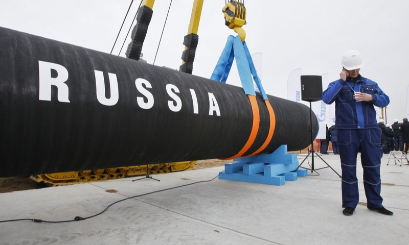 In this April 9, 2010 file photo, a Russian construction worker speaks on a mobile phone in Portovaya Bay some 170 kms north-west from St. Petersburg, Russia, during a ceremony marking the start of Nord Stream pipeline construction. — AP In this April 9, 2010 file photo, a Russian construction worker speaks on a mobile phone in Portovaya Bay some 170 kms north-west from St. Petersburg, Russia, during a ceremony marking the start of Nord Stream pipeline construction. — AP