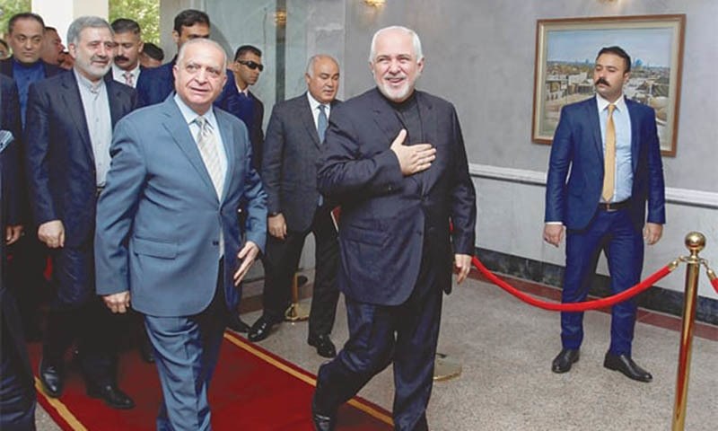 Baghdad: Iranian Foreign Minister Mohammad Javad Zarif walks with Iraqi counterpart Mohamed Ali Alhakim. — Reuters/File Baghdad: Iranian Foreign Minister Mohammad Javad Zarif walks with Iraqi counterpart Mohamed Ali Alhakim. — Reuters/File