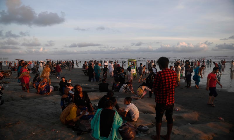 People gather at Sea View Beach despite government ban in Karachi on July 19, 2020. &mdash; AFP