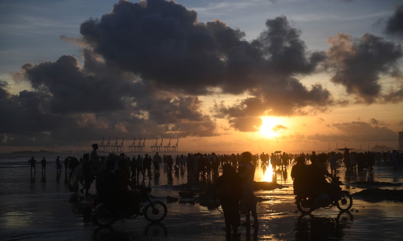 People gather at Sea View Beach despite government ban in Karachi on July 19, 2020. &mdash; AFP