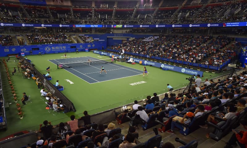 This file photo taken on September 28, 2019 shows Aryna Sabalenka of Belarus hitting a return against Duan Yingying of China and Veronika Kudermetova of Russia during their women's doubles final match at the Wuhan Open tennis tournament in Wuhan. — AFP