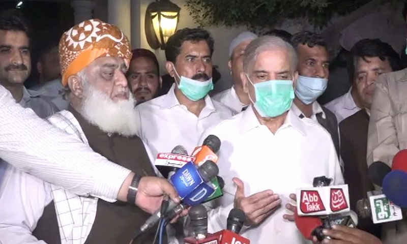 Maulana Fazl and Shahbaz Sharif address the media. — DawnNewsTV