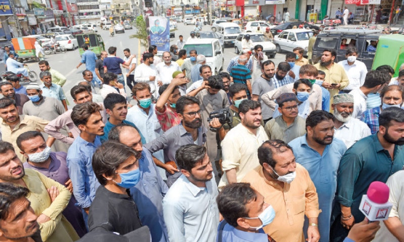 Traders protest against the lockdown in Saddar area of Rawalpindi on Tuesday. — White Star Traders protest against the lockdown in Saddar area of Rawalpindi on Tuesday. — White Star