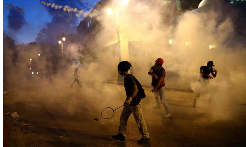 Demonstrators are seen during a protest following Tuesday's blast in Beirut, Lebanon on Aug 9. — Reuters