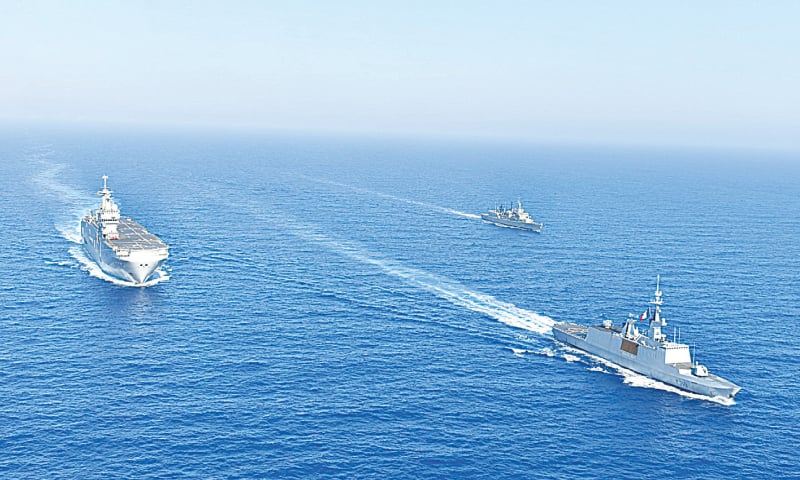 ATHENS: An undated handout image released on Wednesday by Greece shows  Greek and French vessels sailing in formation during a joint military exercise in Mediterranean Sea.—Reuters