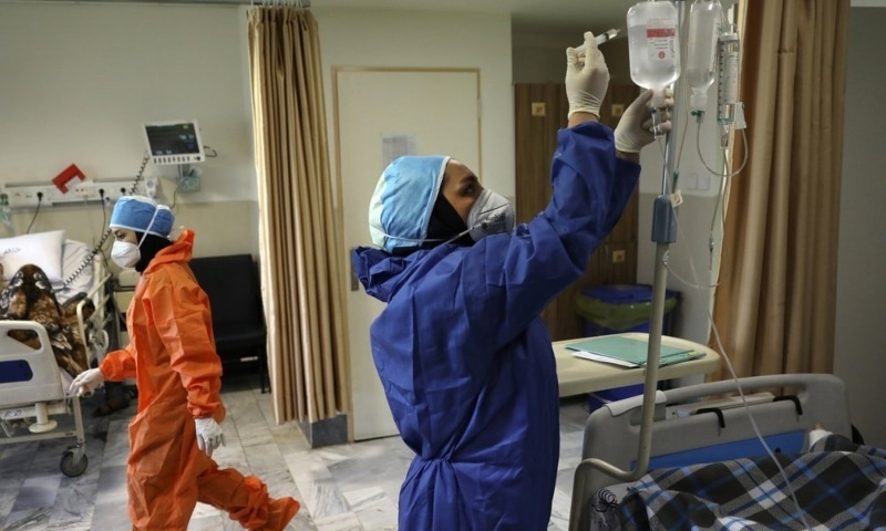 In this June 16, 2020, file photo, nurses tend to Covid-19 patients at the Shohadaye Tajrish Hospital in Tehran. &mdash; AP