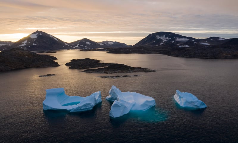 In this August 16, 2019 file photo, icebergs float away as the sun rises near Kulusuk, Greenland. &mdash; AP