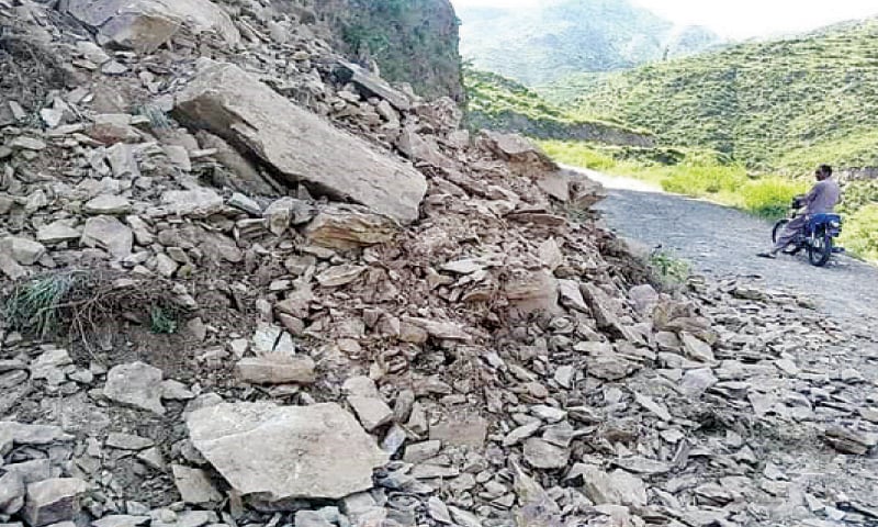 A landslide blocks Torghar-Buner Road in Khanano Dehari area. &mdash; Dawn