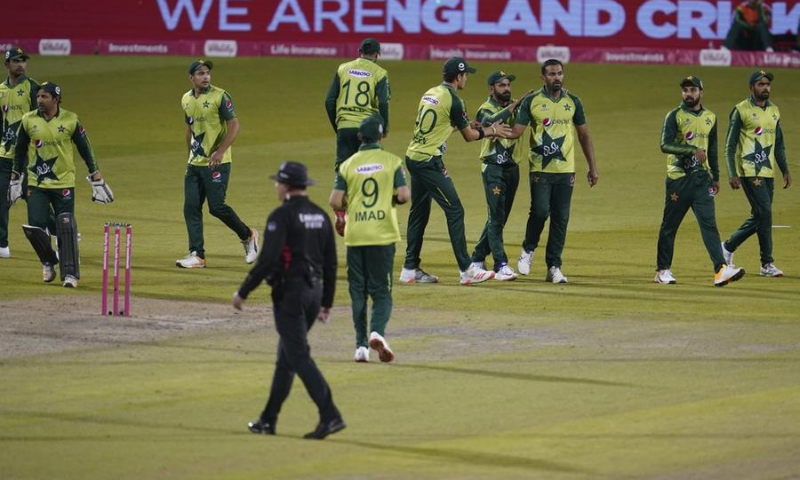 Pakistan's Wahab Riaz, third right, and teammates celebrate the dismissal of England's Moeen Ali during the third Twenty20 cricket match between England and Pakistan, at Old Trafford in Manchester, England. — AP