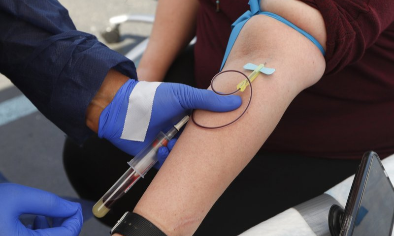 In this June 12, 2020 file photo, a woman has blood drawn for Covid-19 antibody testing in Dearborn, Mich. — AP In this June 12, 2020 file photo, a woman has blood drawn for Covid-19 antibody testing in Dearborn, Mich. — AP