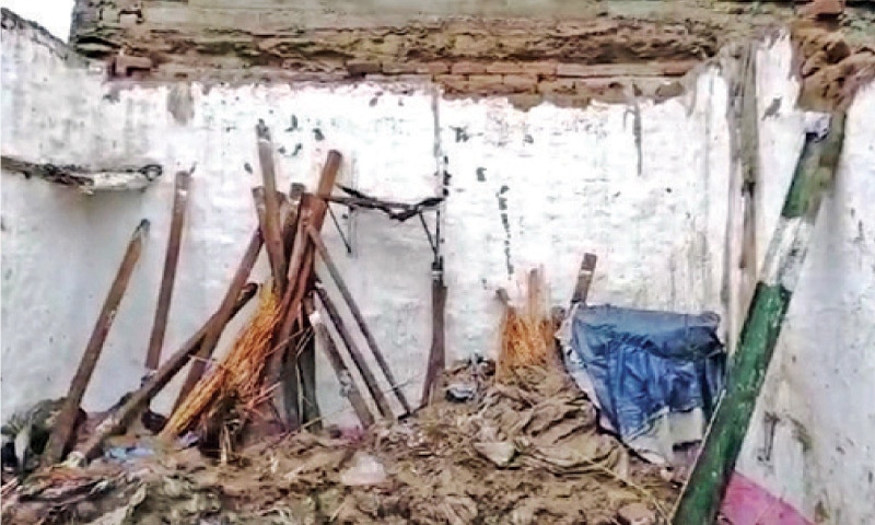 A view of the collapsed roof of a house in Swabi, where five people were killed on Thursday. &mdash; Dawn