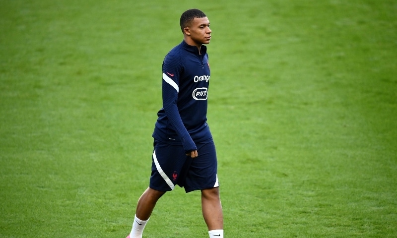 France's forward Kylian Mbappe attends a training session at the Stade de France in Saint-Denis on September 7. &mdash; AFP