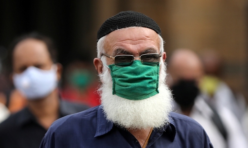 A man wearing a protective mask exits a railway station in Mumbai on September 9. &mdash; Reuters