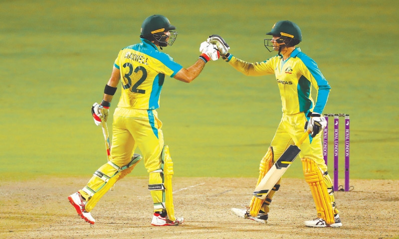 GLENN Maxwell (L) celebrates with fellow century-maker Alex Carey after reaching three figures.—AP GLENN Maxwell (L) celebrates with fellow century-maker Alex Carey after reaching three figures.—AP