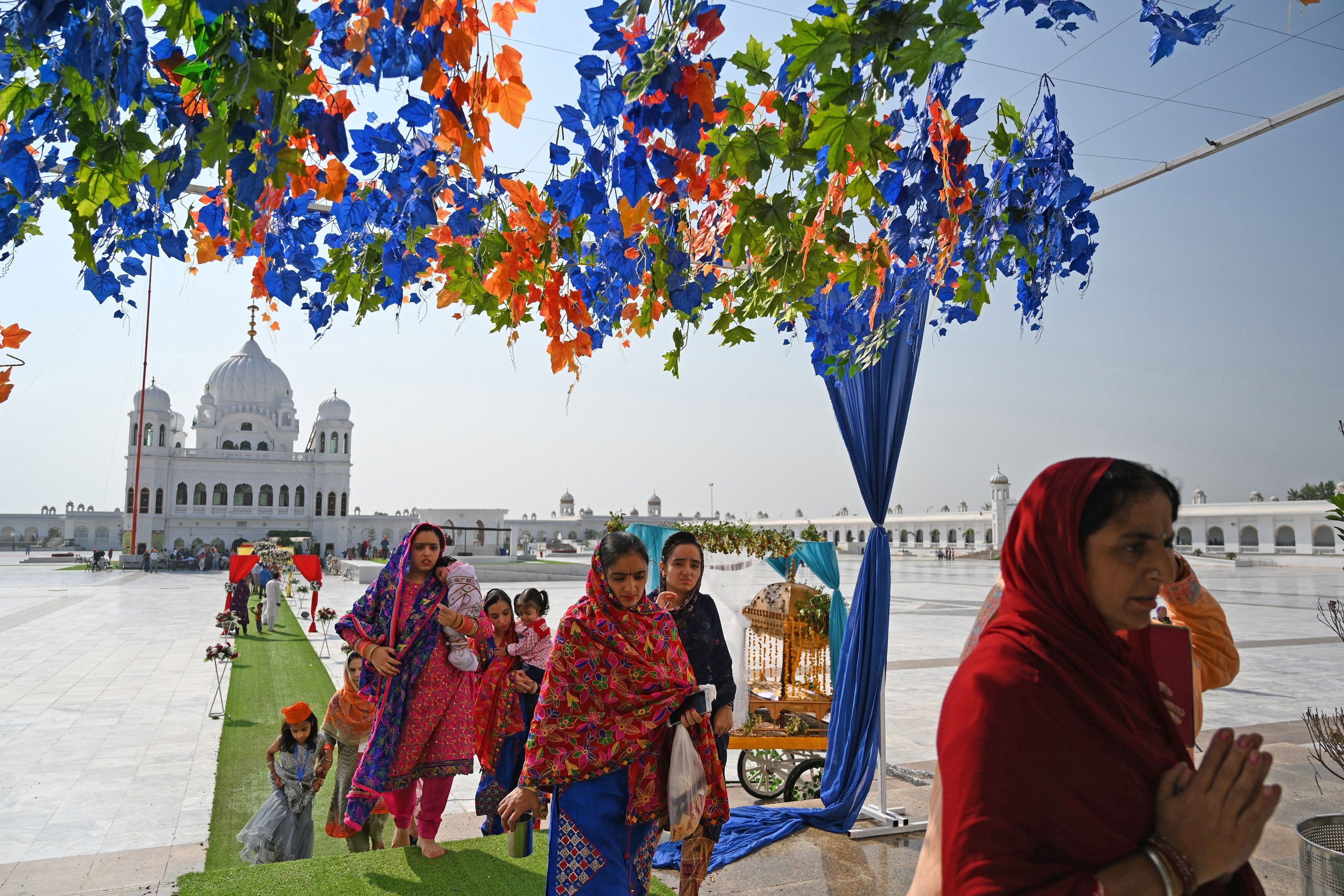 Sikh pilgrims arrive to take part in a religious ritual on the occasion of the 481th death anniversary of Baba Guru Nanak Dev Ji, the founder of Sikhism, at Gurdwara Darbar Sahib in Kartarpur on September 22. &mdash; AFP