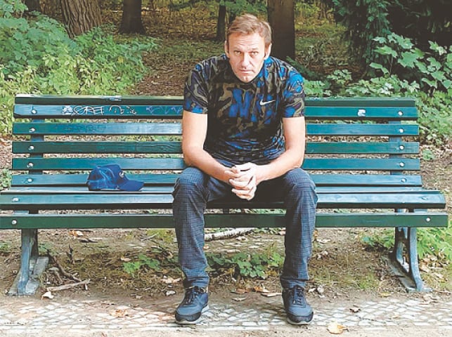 BERLIN: This handout picture posted on Instagram shows Alexei Navalny sitting on a bench in Berlin.—AFP