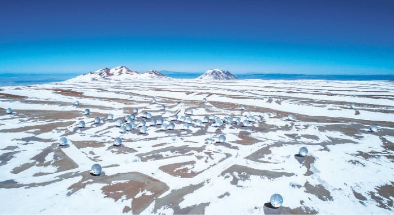 Chajnantor: A picture released by the European Southern Observatory of the Atacama Large Millimetre Array (ALMA) project in Chile’s Atacama desert. The ALMA radio telescope, which with its 66 antennas is the most advanced in the world, enabled astronomers to discover the six giant galaxies entangled in the black hole’s web.—AFP