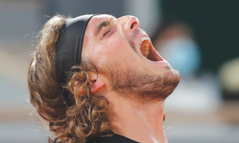 STEFANOS Tsitsipas screams in frustration after losing a point. — AP STEFANOS Tsitsipas screams in frustration after losing a point. — AP
