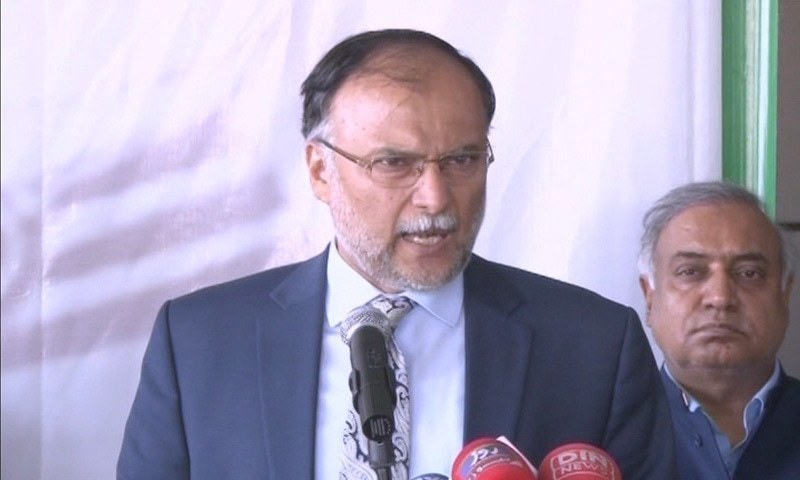 In this file photo, Ahsan Iqbal speaks to reporters in Lahore. ─DawnNewsTV