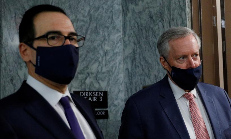 US Treasury Secretary Steve Mnuchin takes questions from news reporters with White House Chief of Staff Mark Meadows following a series of meetings on efforts to pass new coronavirus aid legislation on Capitol Hill in Washington on July 28. &mdash; Reuters/File