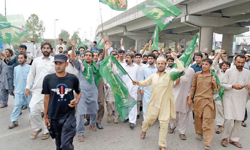 The PTI government booked over 400 workers of opposition parties, mainly the PML-N, in different parts of Punjab on Wednesday ahead of the Pakistan Democratic Movement first public show on Oct 16 in Gujranwala for violation of Covid SOPs. — APP/File