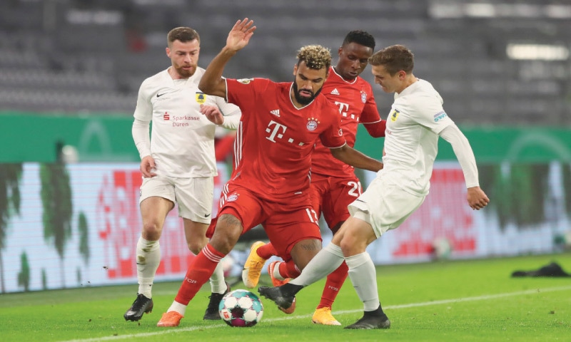 MUNICH: Bayern Munich&rsquo;s Eric Maxim Choupo-Moting (second L) vies for the ball with Durren&rsquo;s Marvin Stormann during their German Cup match at the Allianz Arena.&mdash;AP